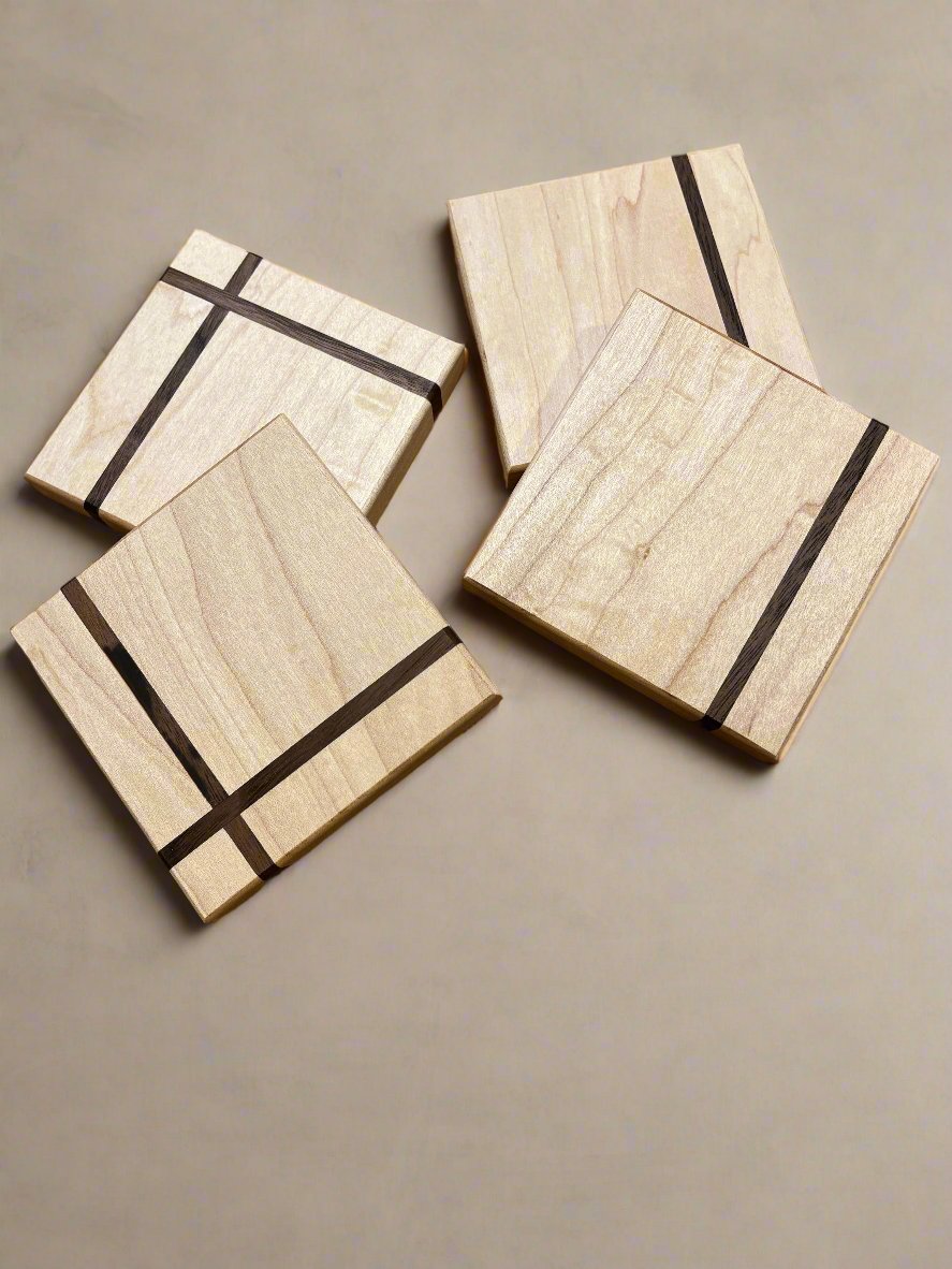 Coaster set (4) Maple w/walnut — item# 1212