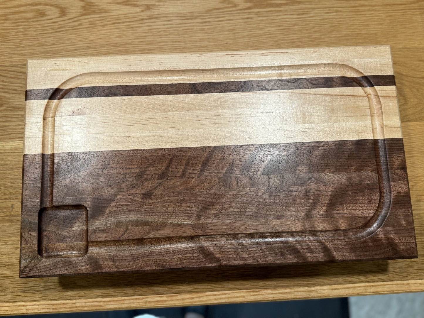 Figured Walnut & Maple cutting board — item# 3157 (Lake Anna)